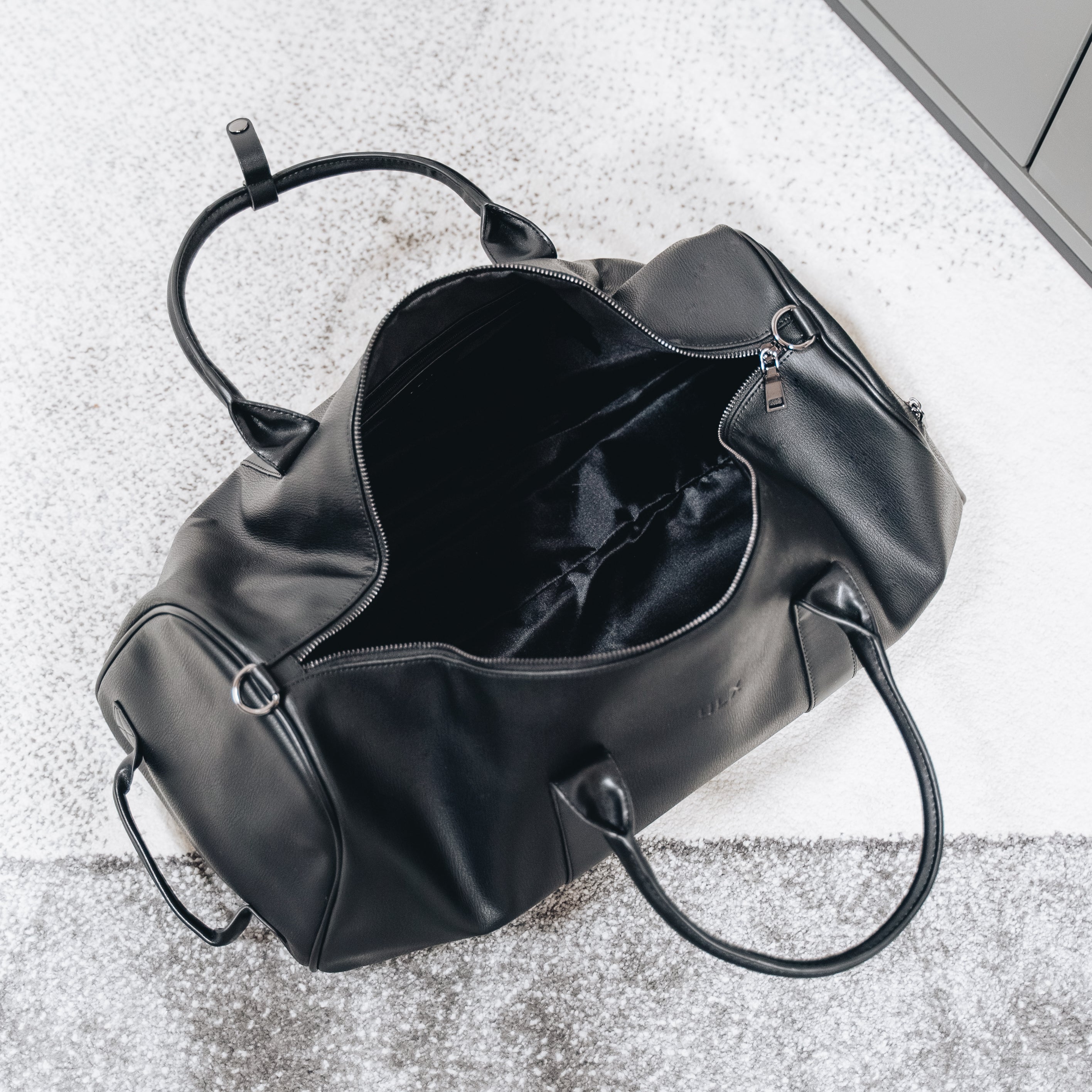 Black leather outlet weekender